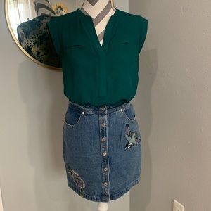 The limited teal blouse